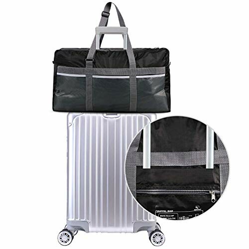 Black travel duffel bag attached to a white suitcase