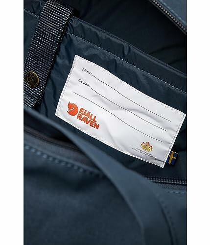 Close-up of a Fjallraven backpack name tag