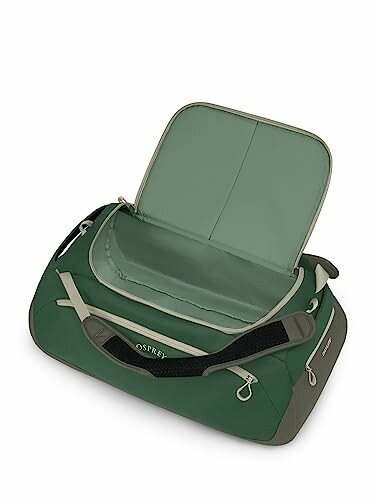 Green duffel bag with open top showing interior