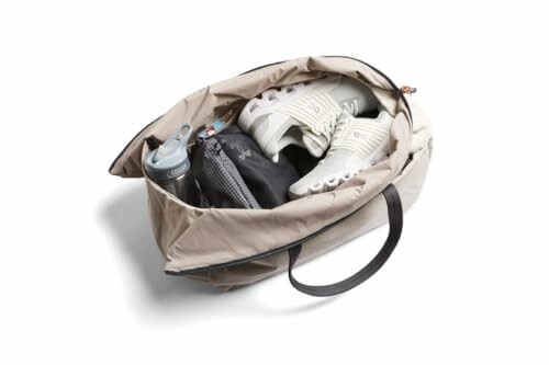 Open gym bag with shoes, water bottle, and clothes